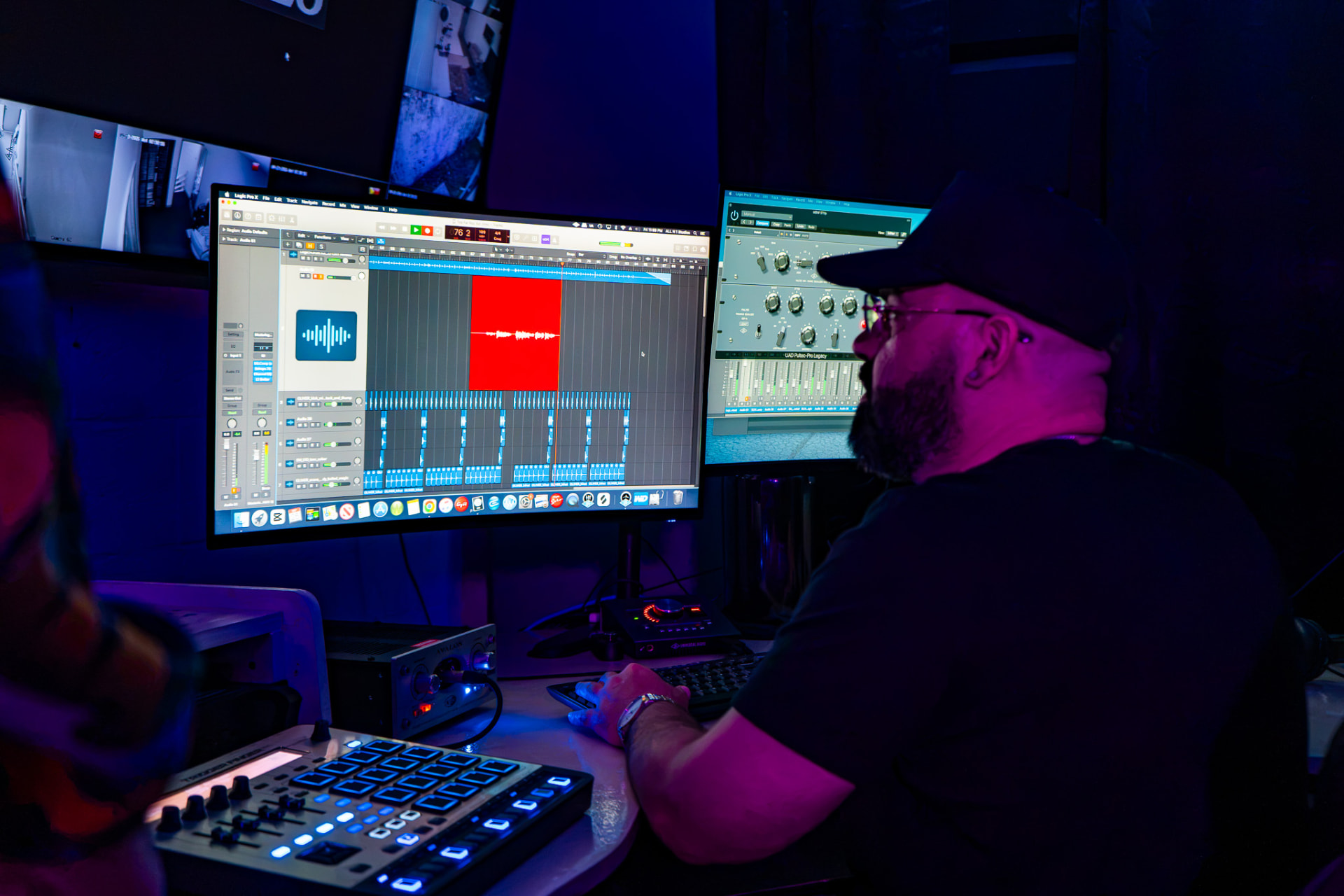 Producer mixing a session in Studio B